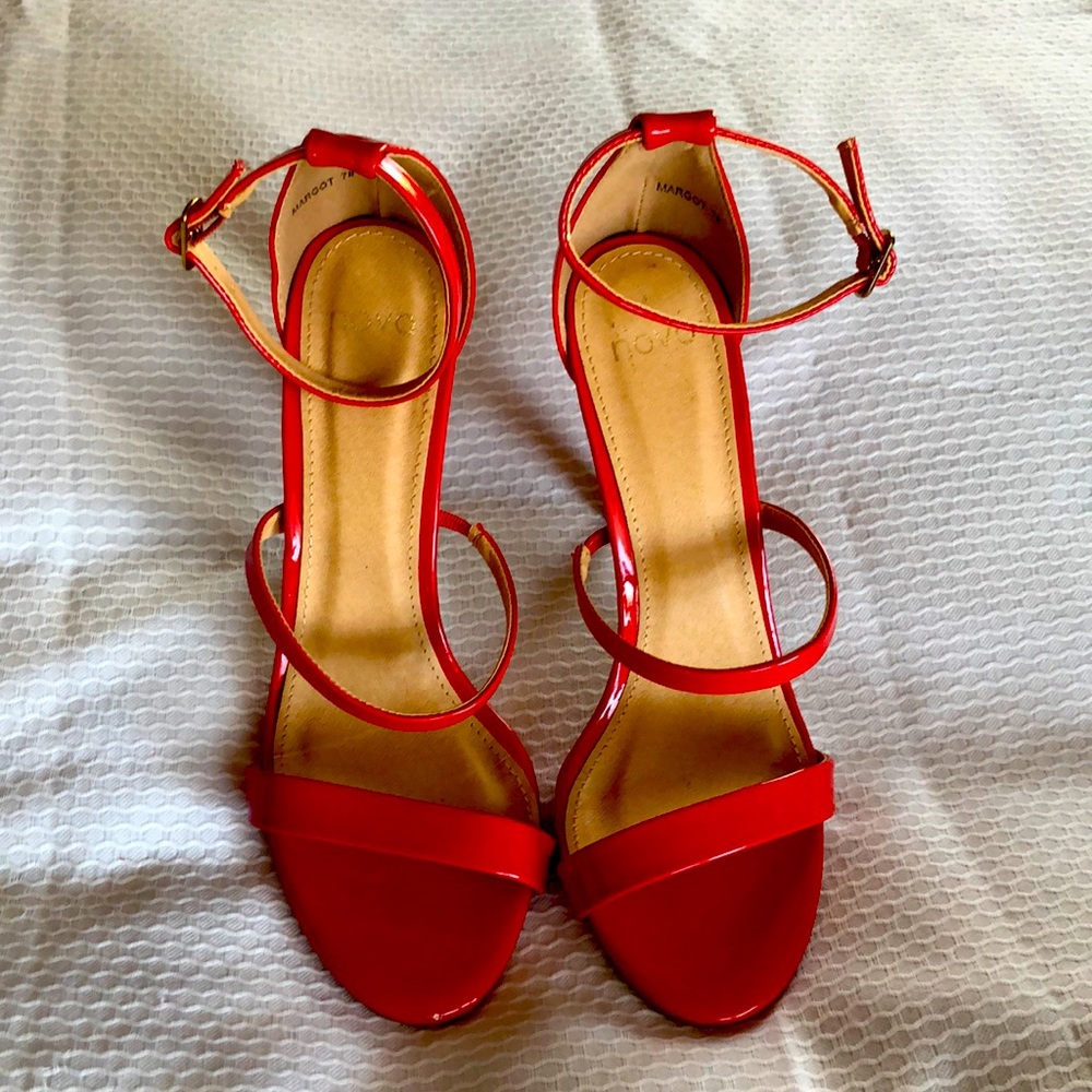 Pair of red “novo” 4” heels size 7 worn once.